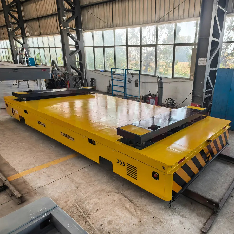 Тележка для перевозки грузов с рельсовым управлением RGV